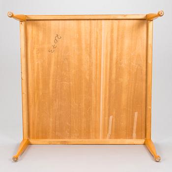 osef Frank, coffee table, "Diplomat", model 2073, Firma Svenskt Tenn, designed in 1949, executed before 1985.
