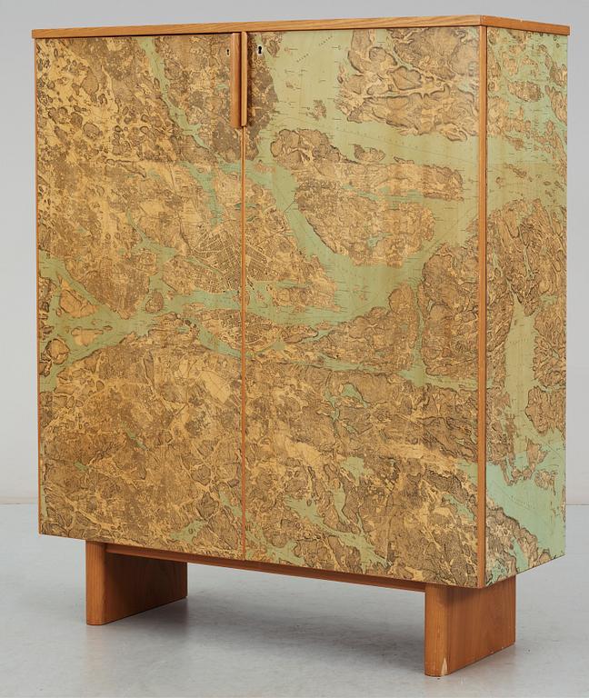 A G.A. Berg cabinet with printed map depicting the city of Stockholm, Sweden 1940's.