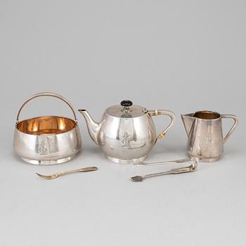 A Russian early 20th century parcel-gilt silver 5 piece tea-set, mark of Grachev, St. Petersburg 1908-1917.