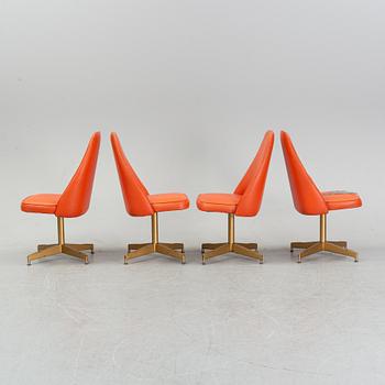 A dining table with four chairs, Walter of Wabash, table dated 1960.