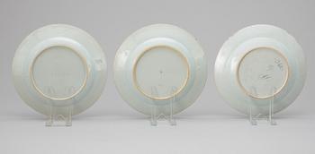 A set of three famille rose dinner plates, Qing dynasty, Qianlong (1736-95).