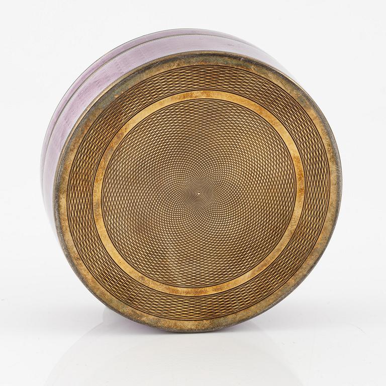 A German 19th century silver gilt and enamel guilloche box with lid.
