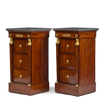 33. A pair of Empire mahogany and ormolu mounted cabinets, Paris, early 18th century.