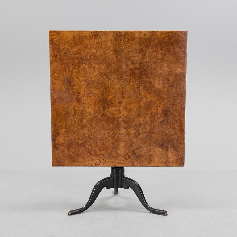 An burr alder veneered folding table, circa 1800.