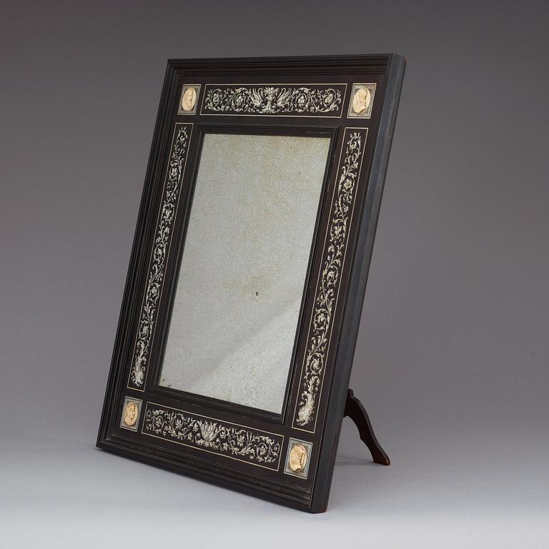 A Renaissance-style 19th century table mirror.