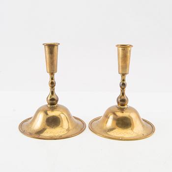 Estrid Ericson, a pair of candlesticks for Firma Svenskt Tenn, mid-20th century, brass.