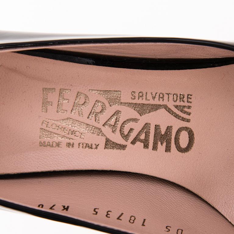 Salvatore Ferragamo, A Pair of Black Patent Leather Wedge Pumps, size 5.5.