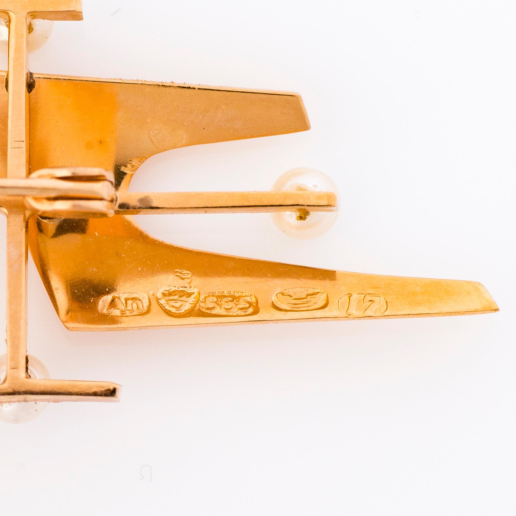 A 14K gold brooch with pearls by Astikainen, Reijo, Helsinki 1962.