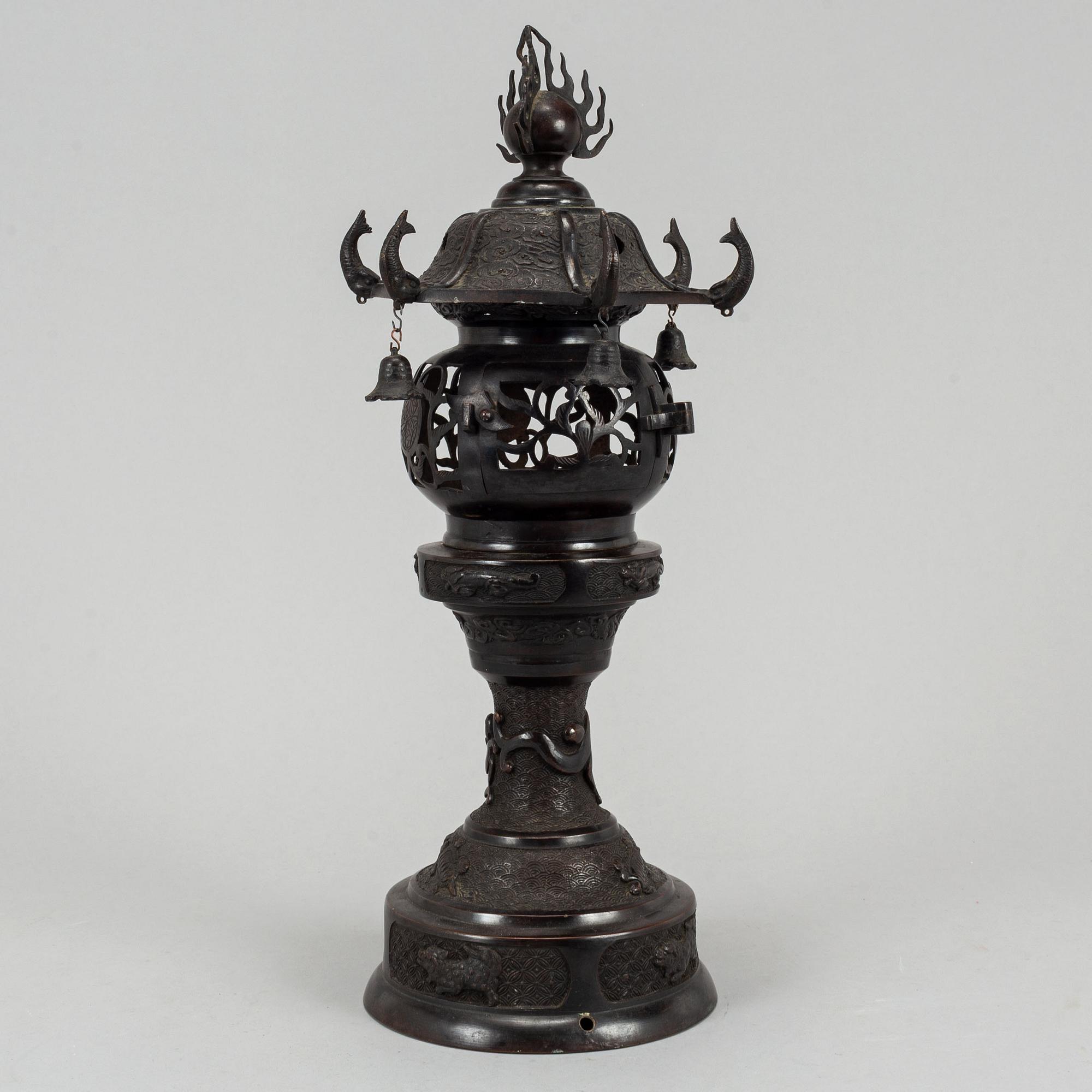 A 20th century Japanese bronze light holder pagoda.