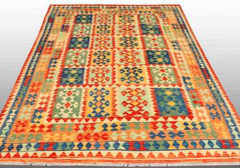 A carpet, Kilim, ca 306 x 201 cm.