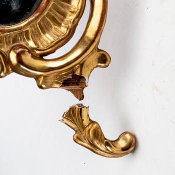 A mid 18th century gilded rococo mirror.