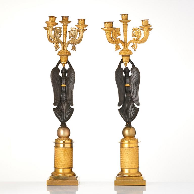 A pair of French Empire five-light candelabra, attributed to Francois Rabiat (bronze maker in Paris 1756-1815).