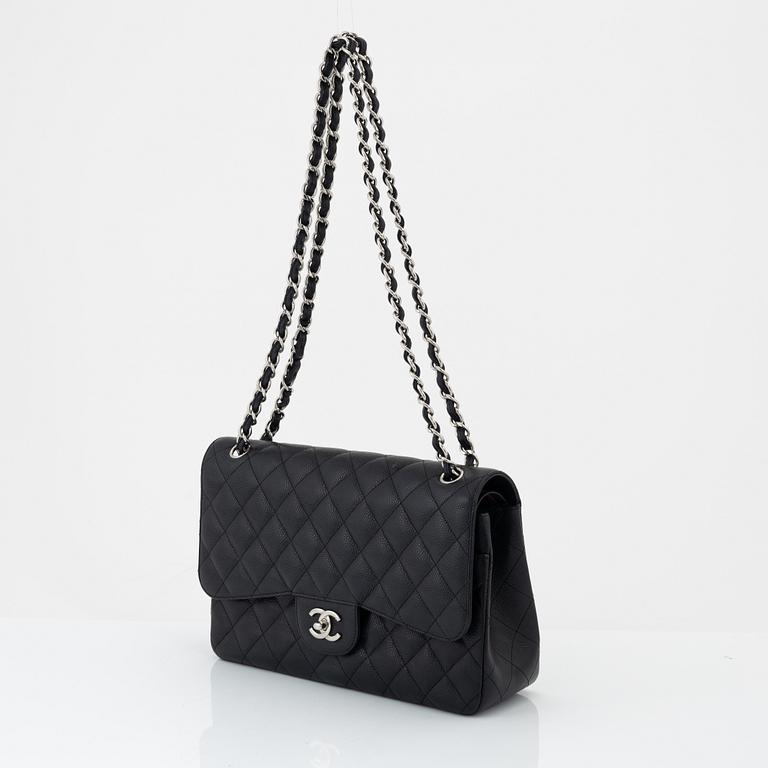 Chanel, a black caviar leather 'Double Flap Bag', 2013-14.