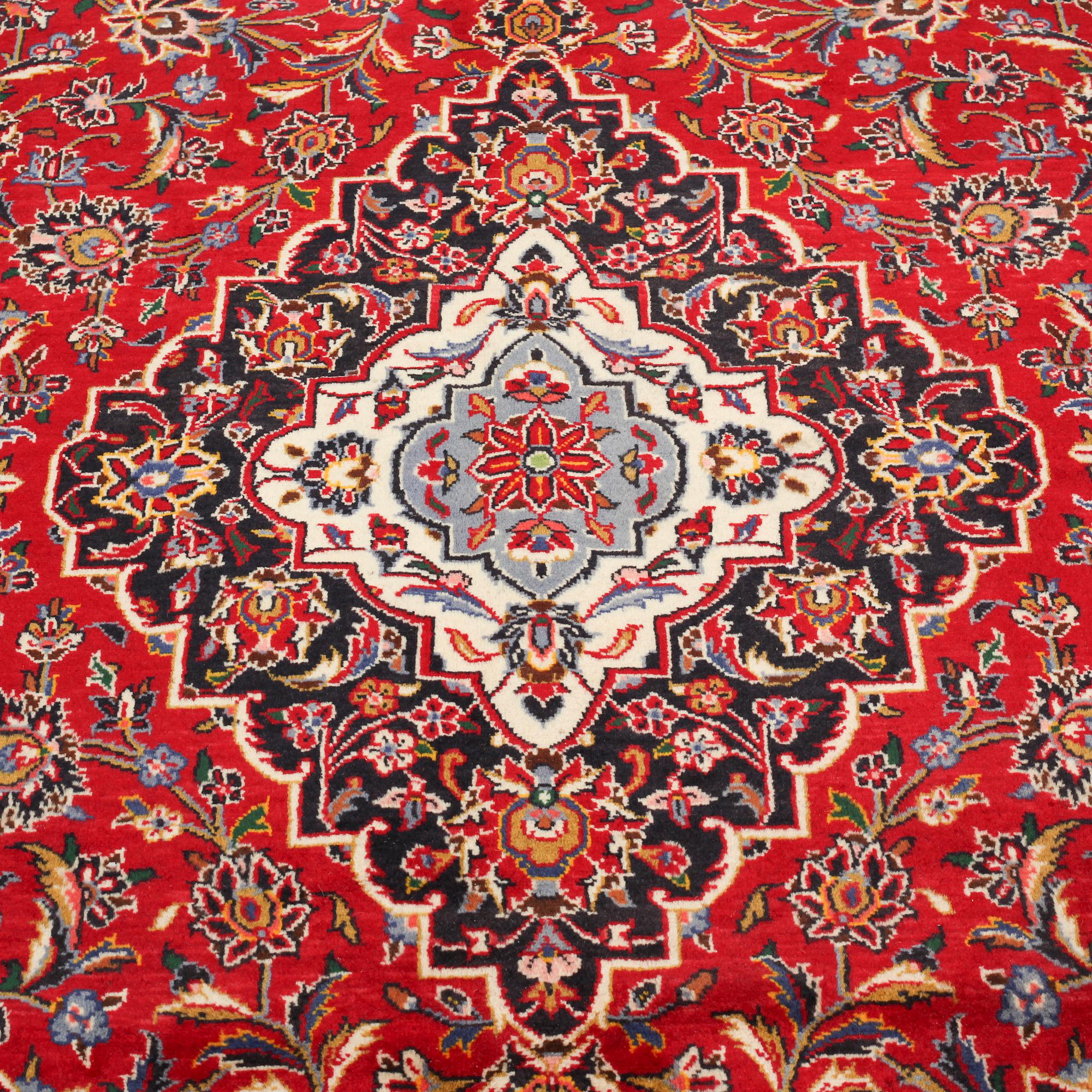 A Keshan rug, 345 x 236 cm.