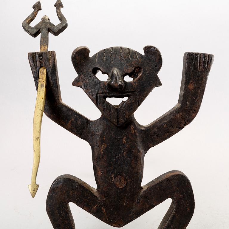 A cast iron fire dog by Eskil Björklund mid 1900s.