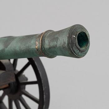 A copy of a field canon with monogram of king  Karl XII produced by Svensk Metallkonst, Carlscrona in late 20th century.