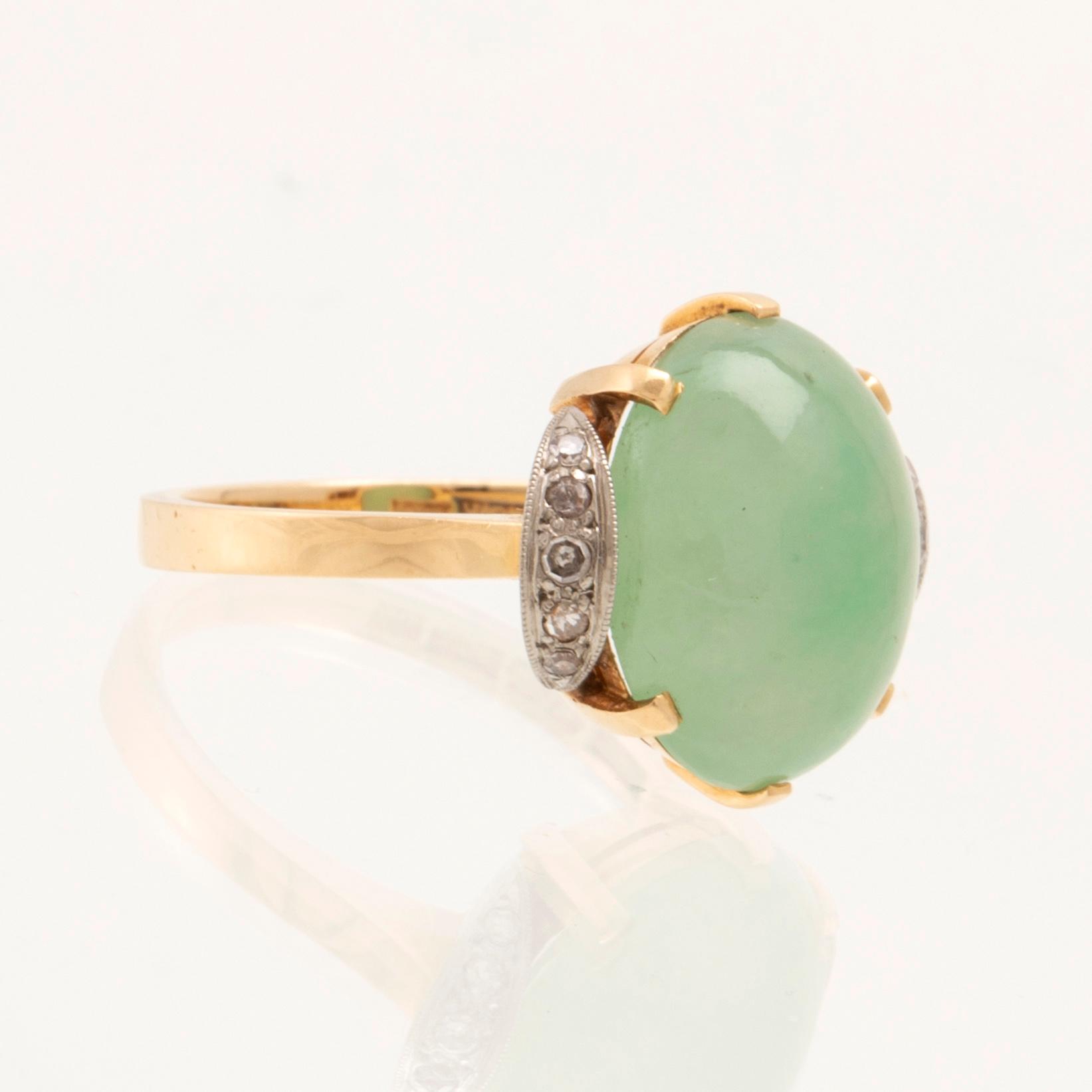 Börje Löfgren, ring in 18K white and red gold with an oval cabochon-cut jadeite and single-cut diamonds, Stockholm 1964.