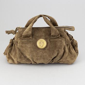 Gucci, a suede bag.