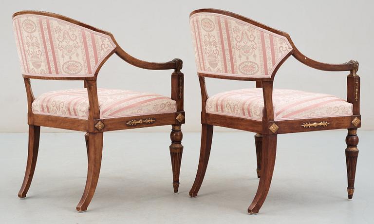 A pair of late Gustavian armchairs in the manner of E. Ståhl.