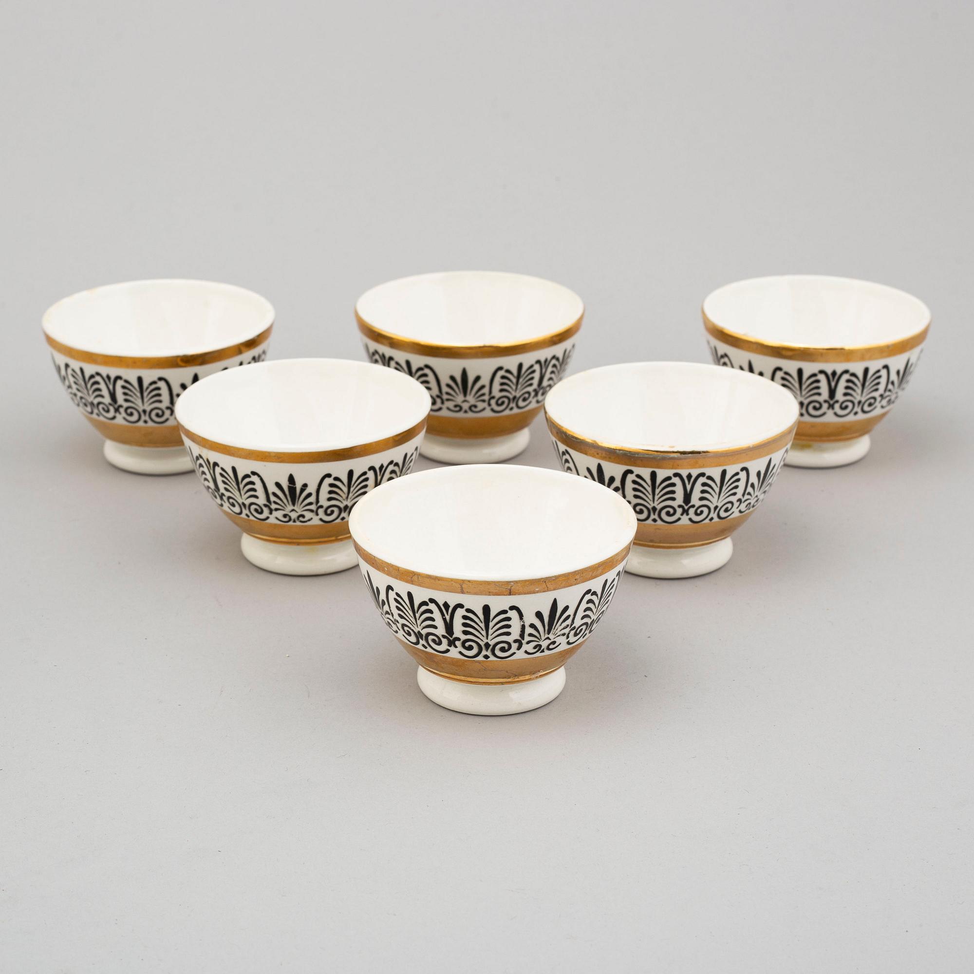 PIERO FORNASETTI, tallrikar, 4 st, samt skålar, 6 st, porslin, Milano, Italien.