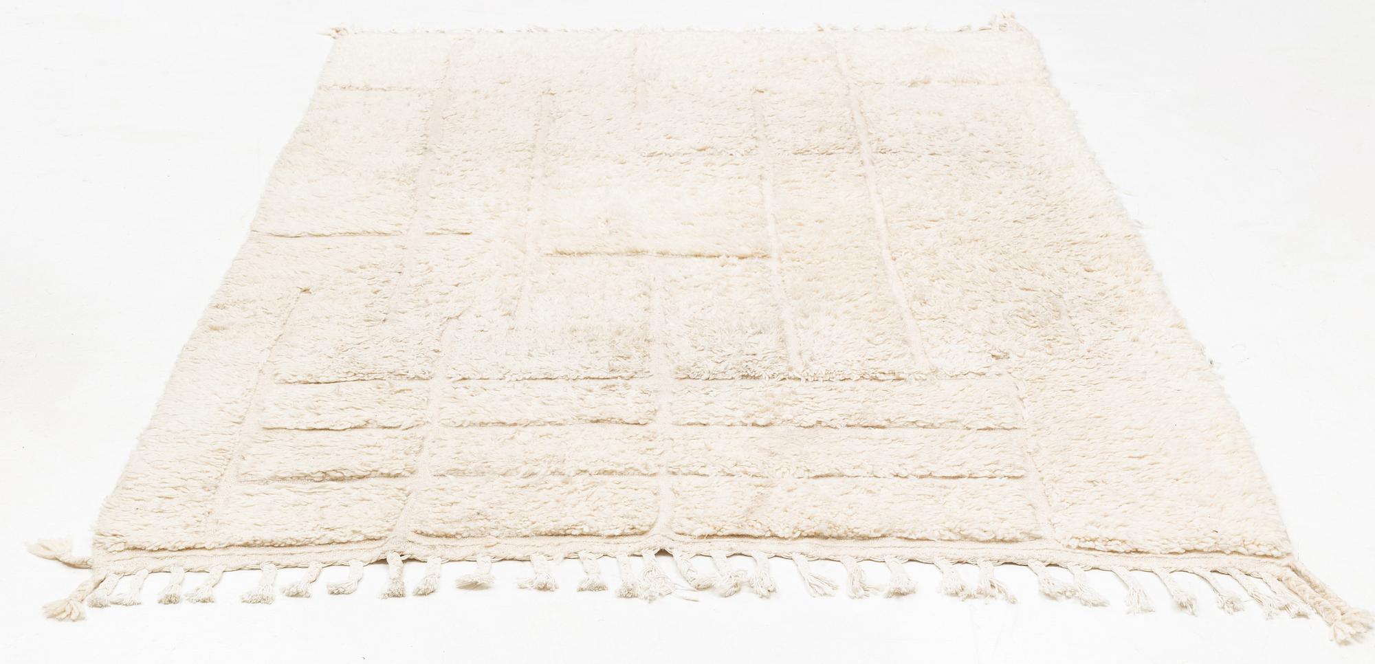 A Moroccan carpet, circa 308 x 181 cm.