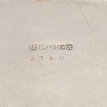 A set of four silver plated entree dishes, England.