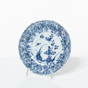 Two Chinese blue and white porcelain dishes and a small dish, Qing dynasty, 18th century.