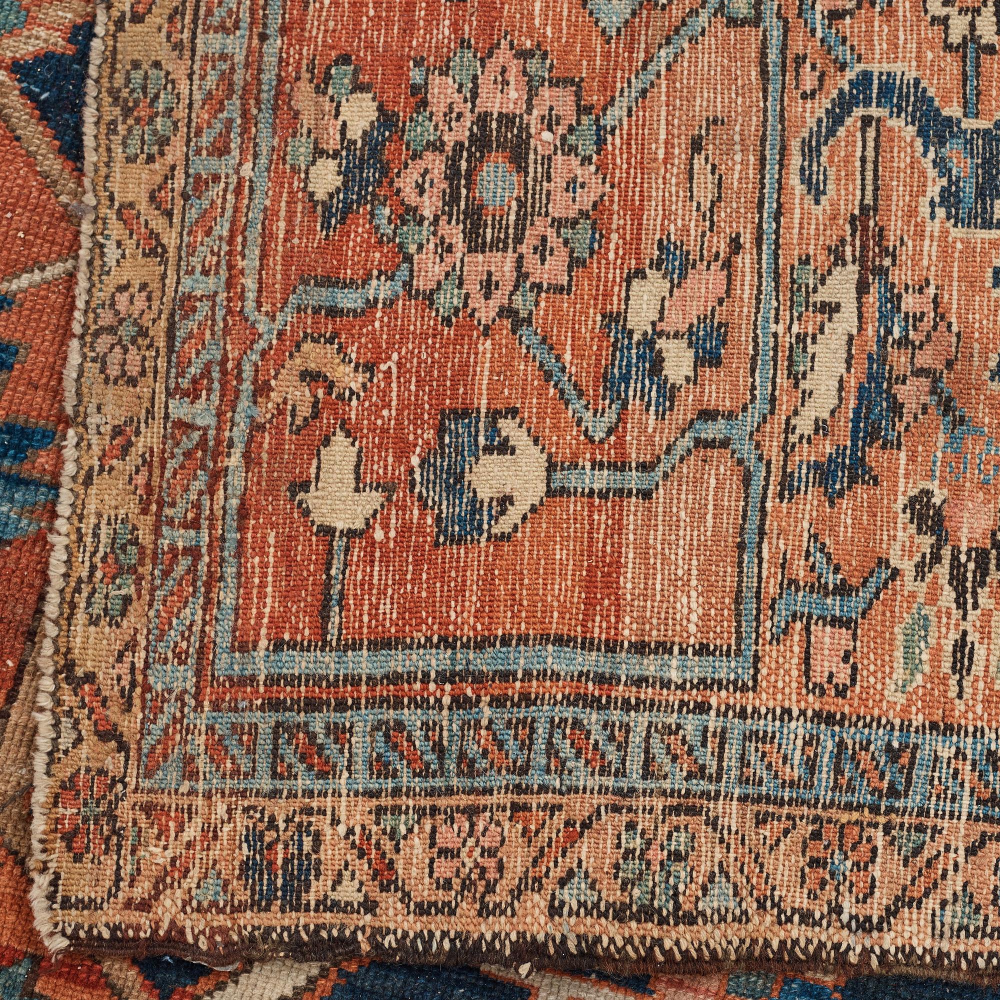 A CARPET, an antique northwest Persian, ca 414-425 x 248,5-260 cm.