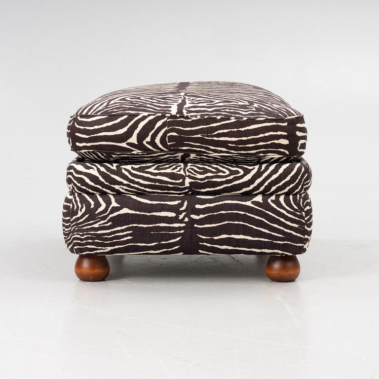 Josef Frank, a model 336 ottoman, Svenskt Tenn.