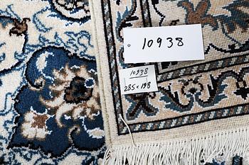 A carpet, Nain, 285 x 196 cm.