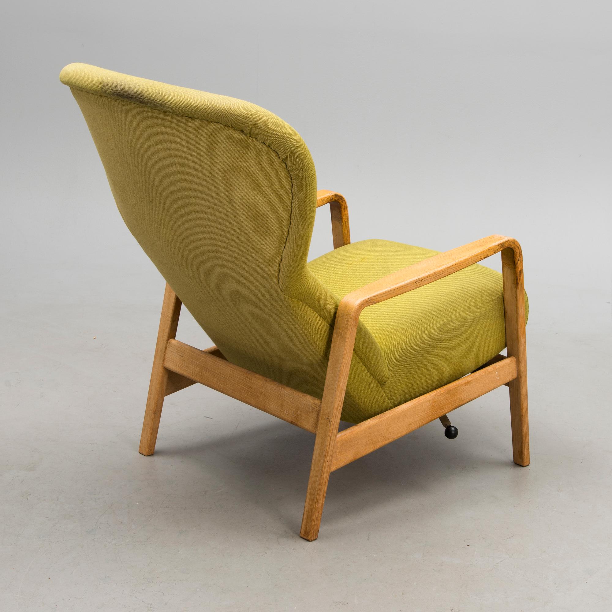 A 1960s 'Puck' armchair for Keravan Puusepäntehdas, Stockmann, Finland.