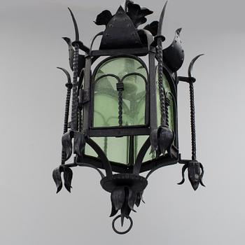 A wrought iron ceiling light first half of the 20th century.
