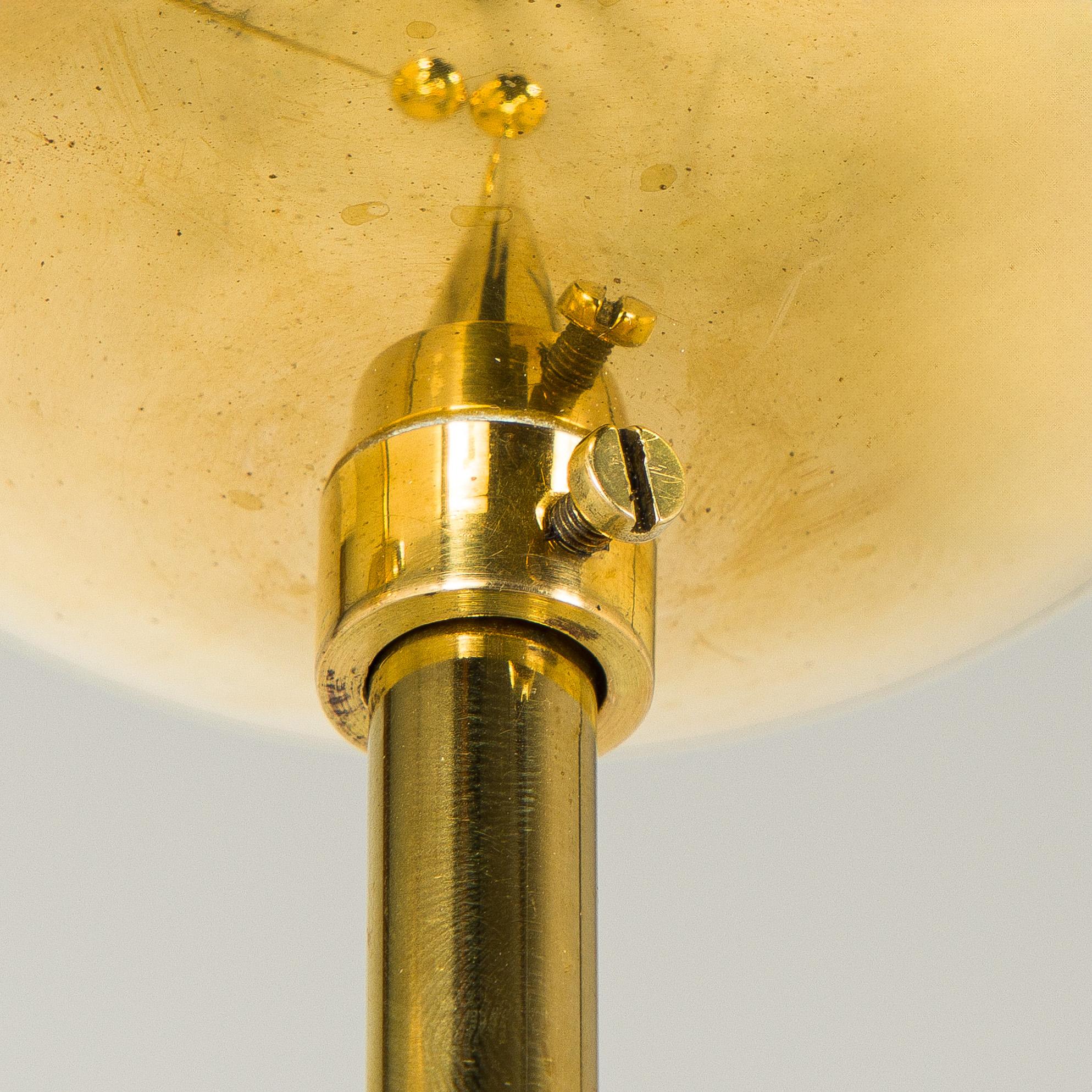 Paavo Tynell, a pair of mid 20th century ceiling lights, model 1699, for Taito / Idman.