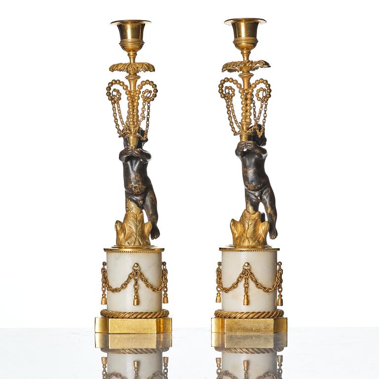 A pair of presumably German Louis XVI candlesticks, circa 1800.