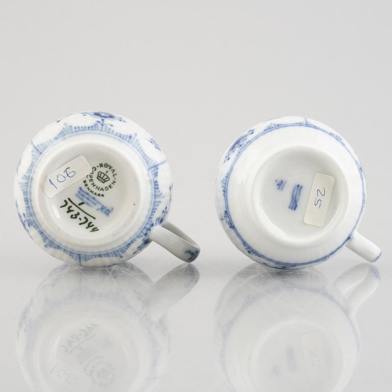 Two 'Blue Fluted' / 'Musselmalet rifflet' porcelain cream cups with covers, Royal Copenhagen, 19th century and 1964.