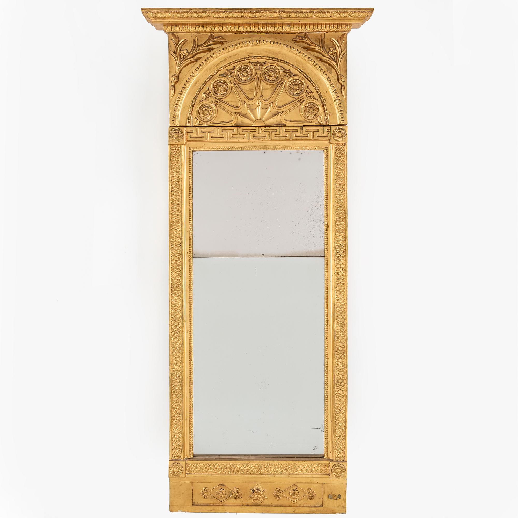 A Swedish Empire mirror, early 19th century.