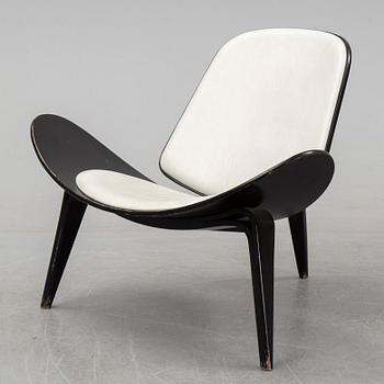 Hans J Wegner, a 'The Smiling Chair/CH07' easy chair from Carl Hansen & Søn, Odense, Denmark.