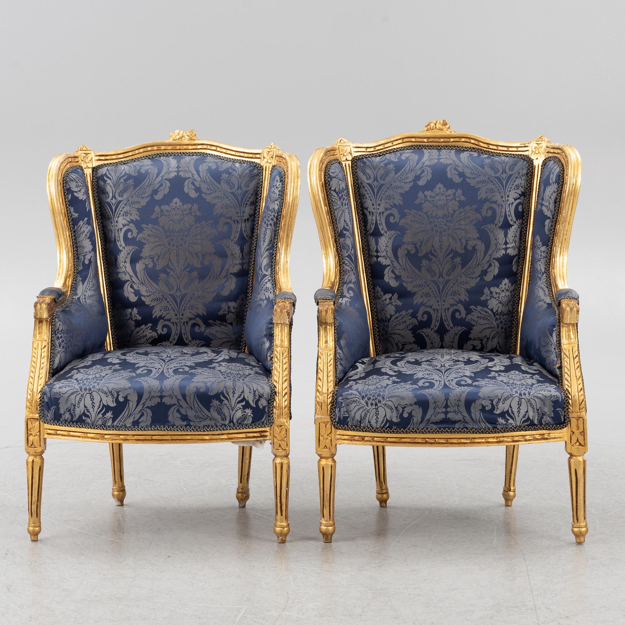 A pair of Louis XVI style armchairs, late 20th Century.