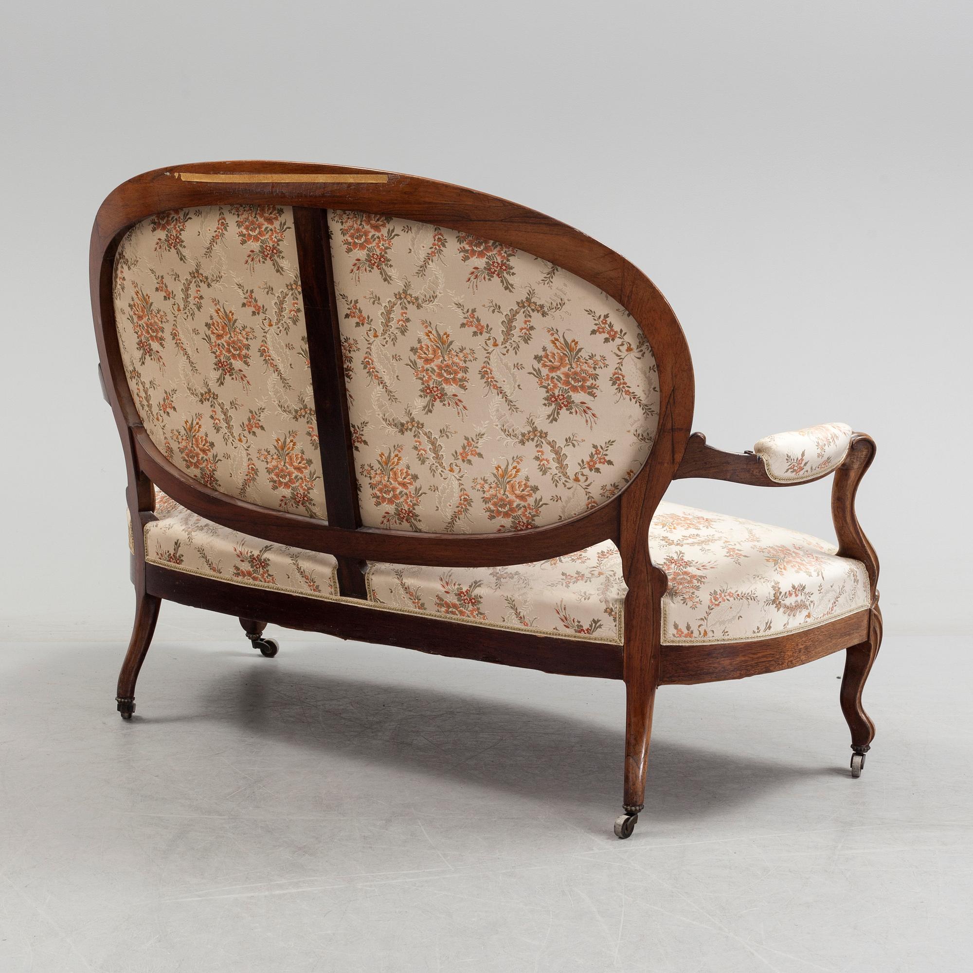 A sofa, two armchairs and two chairs, rococo style, first half of the 20th century.
