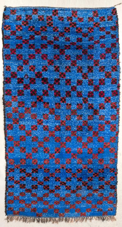 A Moroccan carpet approx 339x193 cm.