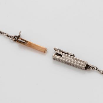 A necklace in 18K gold and platinum with an old-cut diamond ca 1.00 ct quality ca H vs.