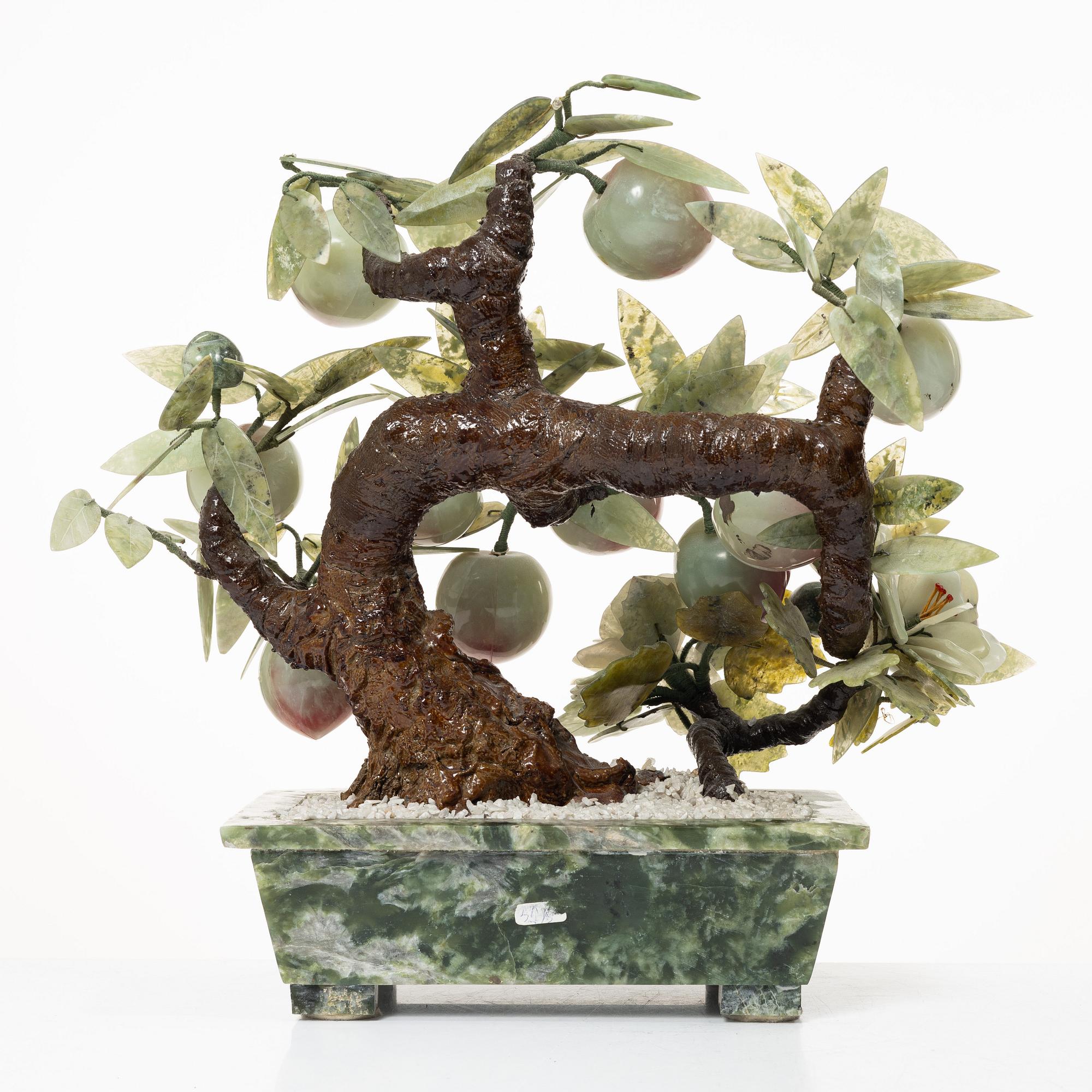 A stone table decoration in the shape of a peach tree, China, 20th century.