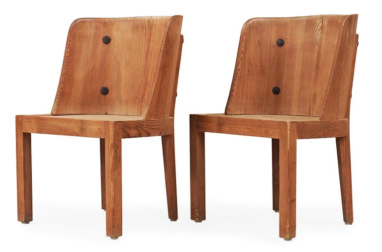A pair of Axel Einar Hjorth stained pine 'Lovö' chairs by Nordiska Kompaniet, 1930's.