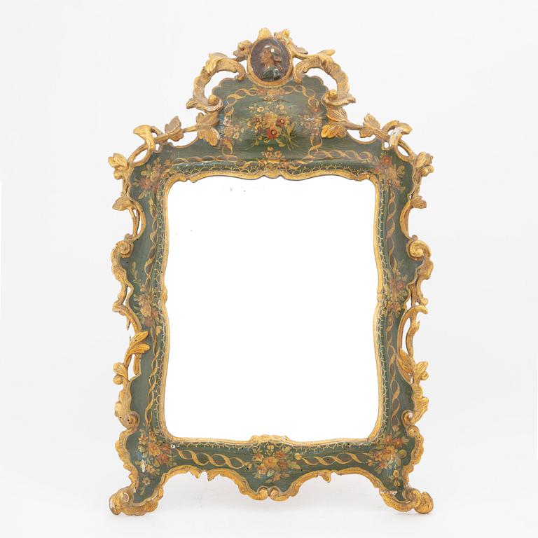 A Rococo style table mirror, probably southern Europe, around the year 1900.