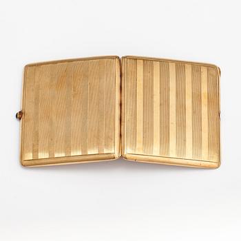 A 14K gold cigarette case. Marked Diana.