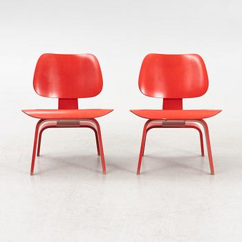 Charles & Ray Eames, fåtöljer, ett par, "LCW", Vitra, daterade 2003.