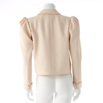 YVES SAINT LAURENT, a creme color silk jacket.