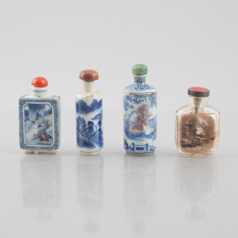 A group of nine Chinese glass and porcelain snuffbottles, 20th century.