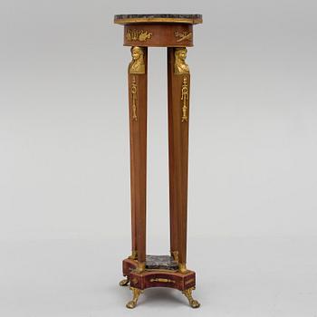 An early 20th century pedestal.