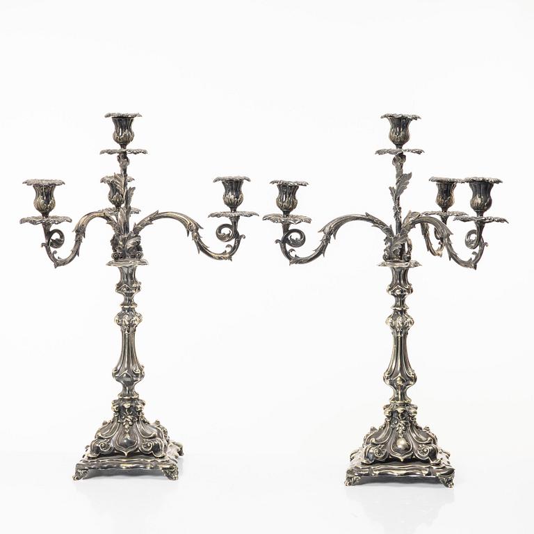 A pair of silver plated Rococo style candelabra, 20th century.